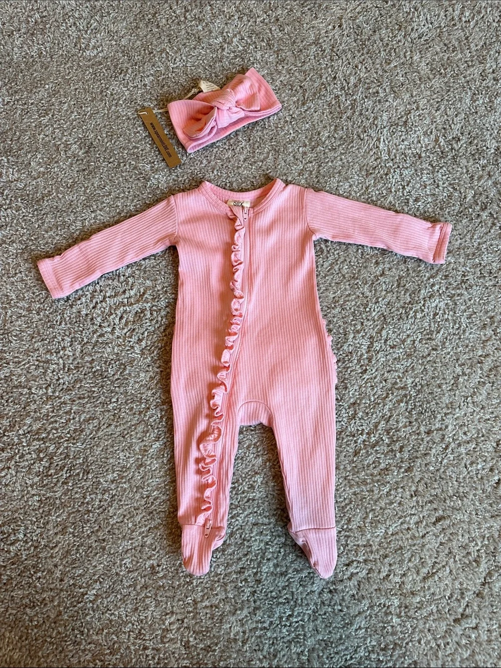 Pink organic ribbed frill zip footie with matching headband